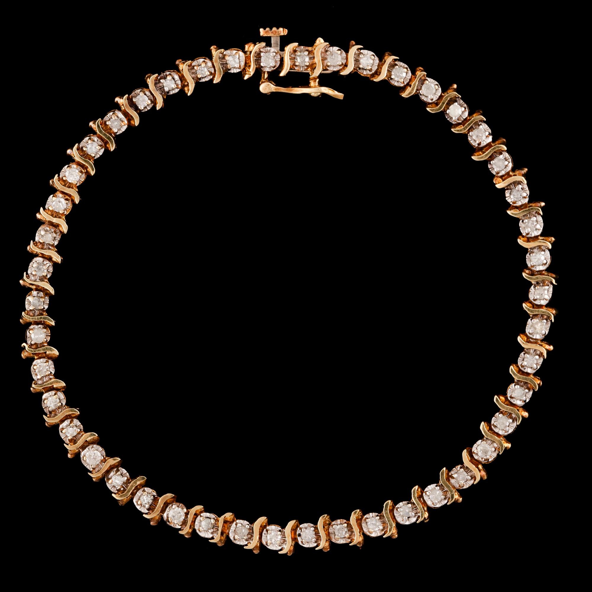 ARMBAND, sk tennisarmband, 14k guld med diamanter tot ca0,46ct. Vikt 5,7g.