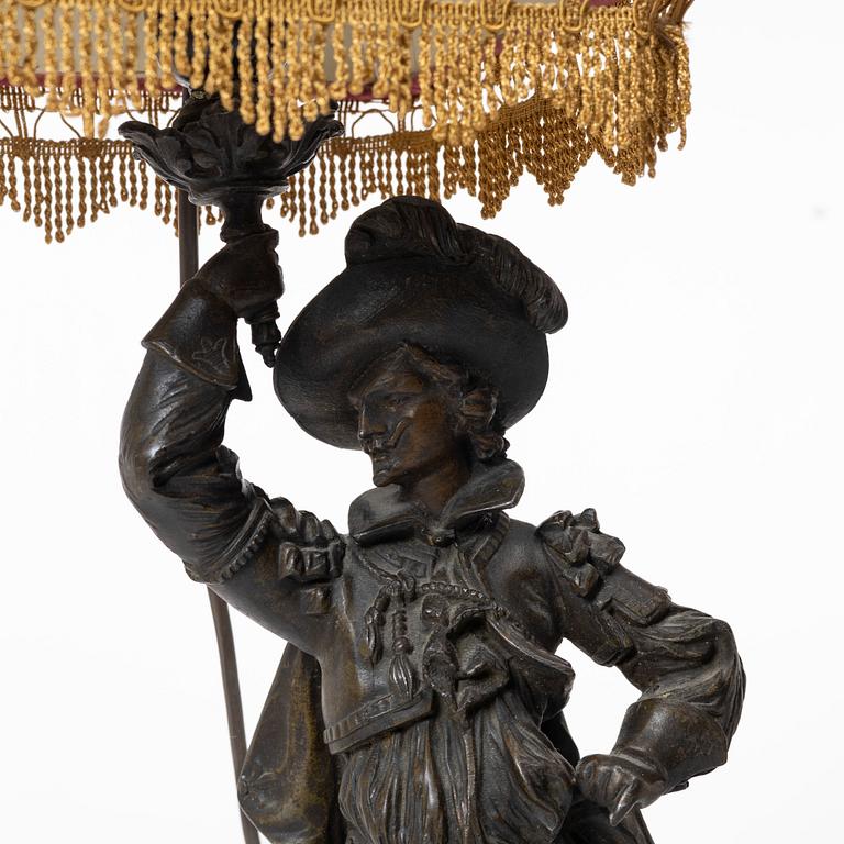 Auguste Poitevin, after, a pair of "Frondeur" sculptures/tablelamps, France, early 20th century.