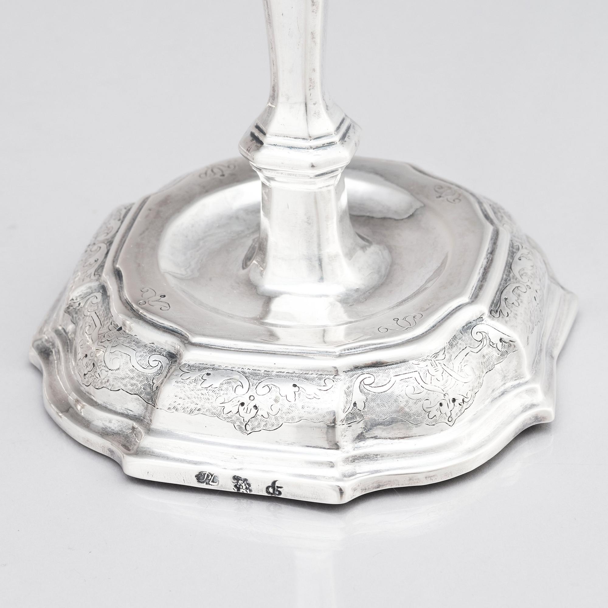 A pair of Swedish early 18th century silver candlesticks, mark of Petter Ersson Lund, Stockholm 1727.