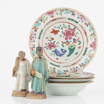 A set of four famille rose dessert dishes, and two Chinese porcelain figures, Qing dynasty, 18th / 19th Century.