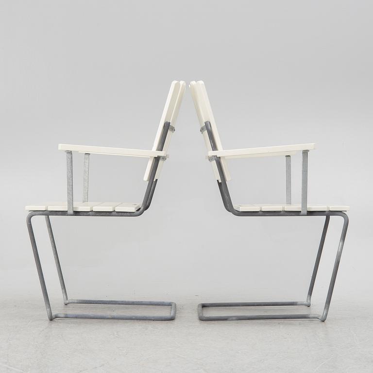 Arthur Lindquist, four armchairs model A2 and a table 9A, Grythyttan's steel furniture.
