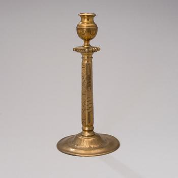 A brass candlestick from Flanders / Germany of the turn of the 17th century.