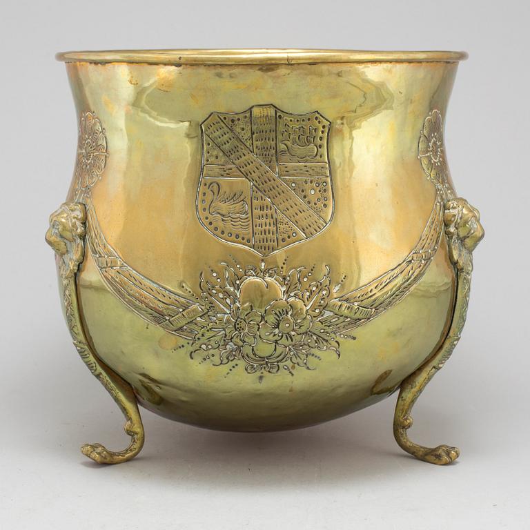 An 18th century brass flower pot.