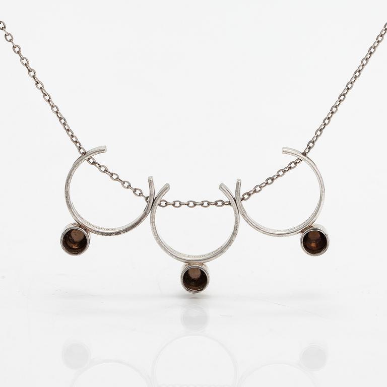 Elis Kauppi, A silver and smoky quartz necklace. Kupittaan kulta, Turku 1961.