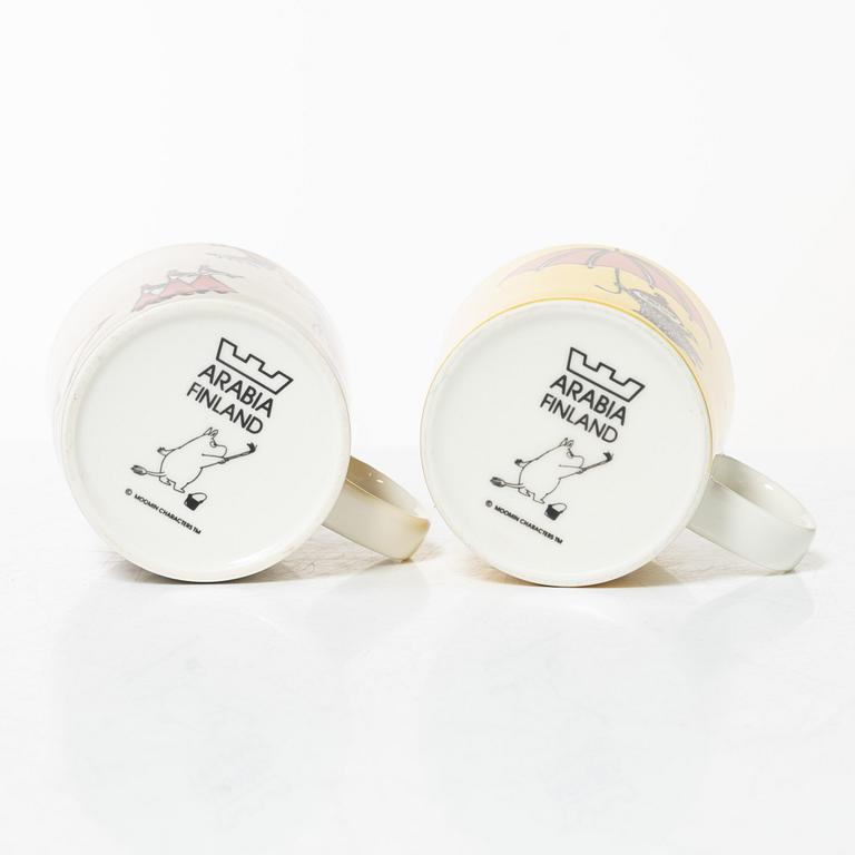 A set of 31 Moomin mugs, Arabia, Finland.
