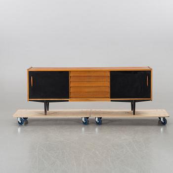 A teak sideboard with black details, by Troeds Sweden, 1960's.