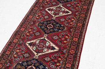 An oriental runner carpet, c. 266 x 89 cm.