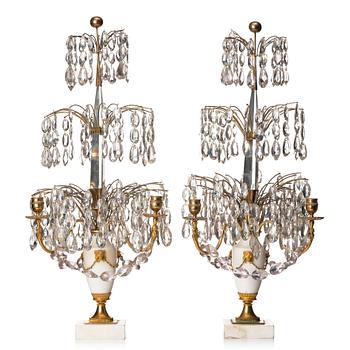 120. A pair of Gustavian three-light girandoles.