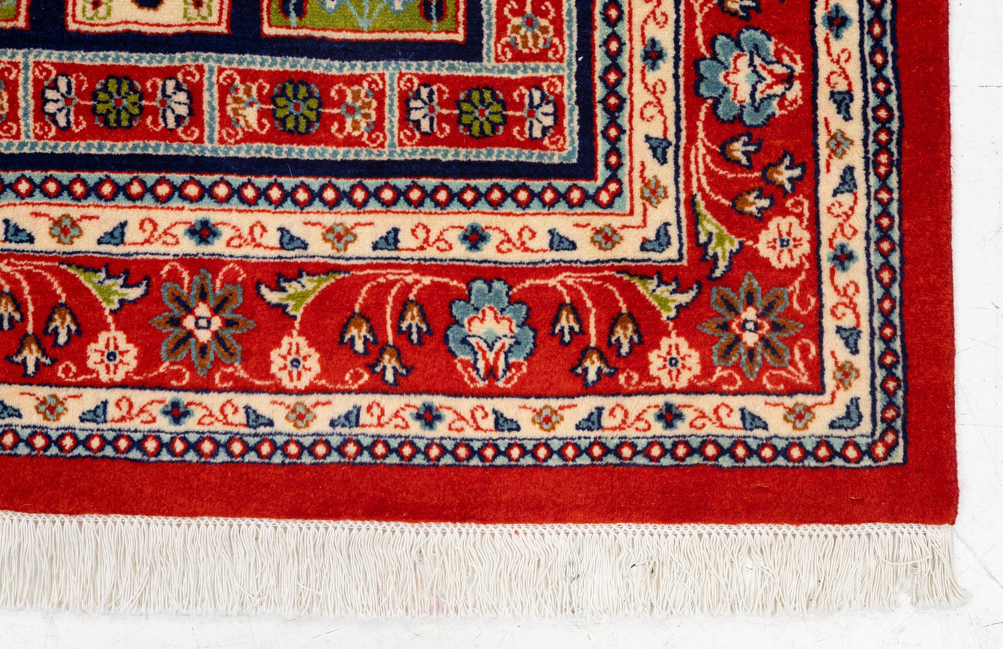 A Kashmar carpet, c. 236 x 168 cm.