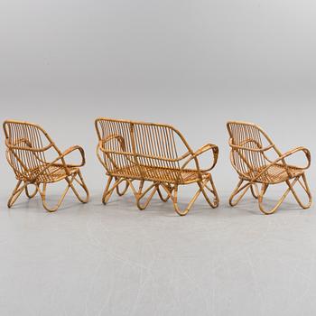 A second half of the 20th century sofa, table and armchairs.