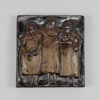 A stoneware wall relief by Åke Holm, signed.