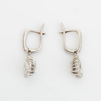 Pear shaped diamond earrings.