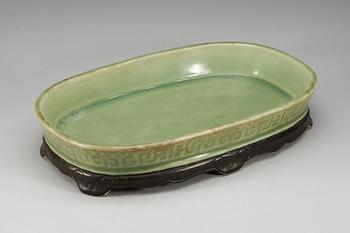 A celadon glazed narcissus jardiniere, Qing dynasty.