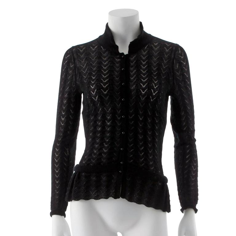 LOUIS VUITTON, a black cashmere cardigan.