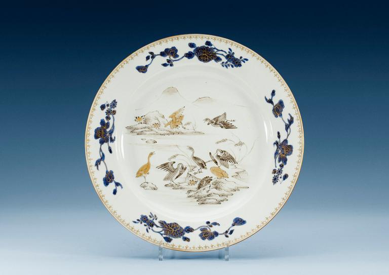 A grisaille and underglaze blue charger, Qing dynasty, Qianlong (1736-95).