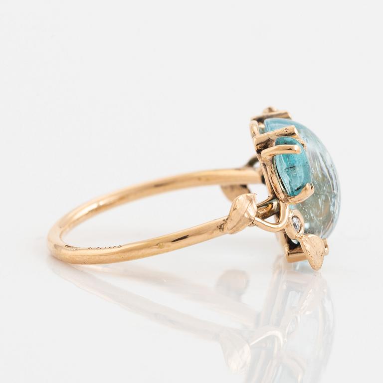 Cabochon cut topaz, apatite and brilliant cut diamomnd ring.