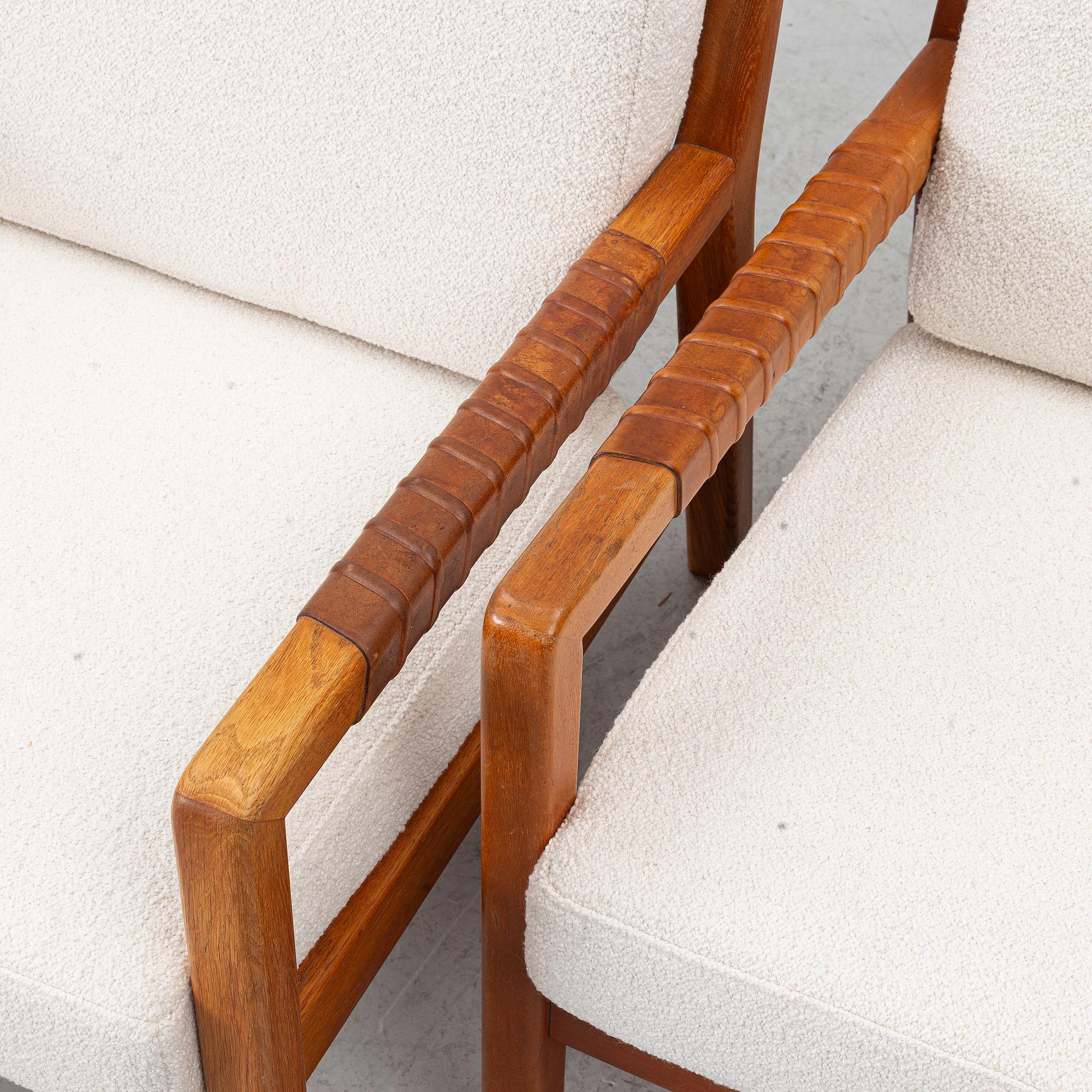 Carl Gustaf Hiort af Ornäs, a matched pair of 'Rialto' lounge chairs, Puunveisto Oy - Träsnideri Ab, Finland, mid-20th century.