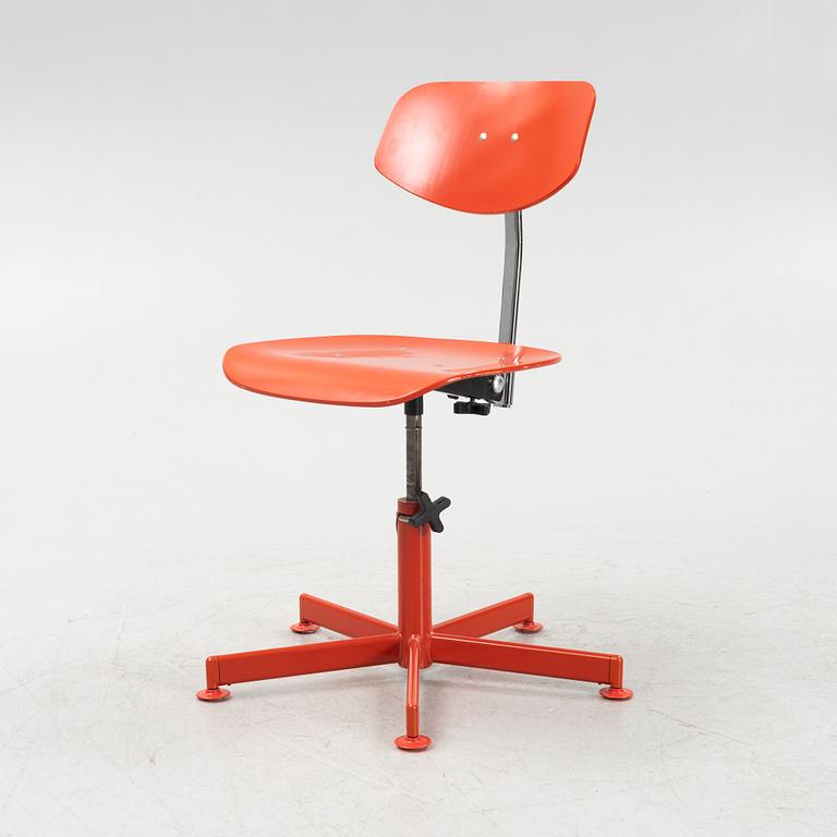 A red desk chair, 1970's.