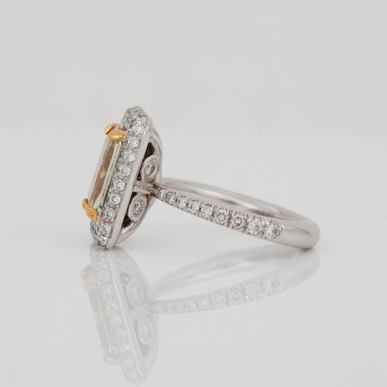 A 3.02 ct radiant-cut Fancy Yellow/VVS2 ring. Certificate from HRD.