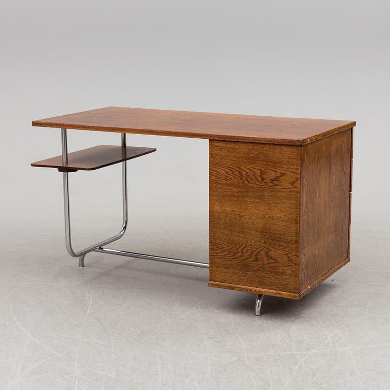 A 1930s writing desk by Jindrich Halabala and chair by Mart Stam.