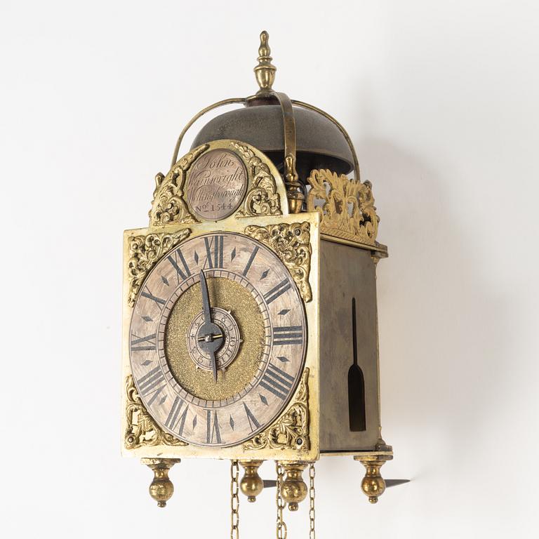 A George II brass lantern clock by John Wainwright (watchmaker in Wellingborough 1738-51).