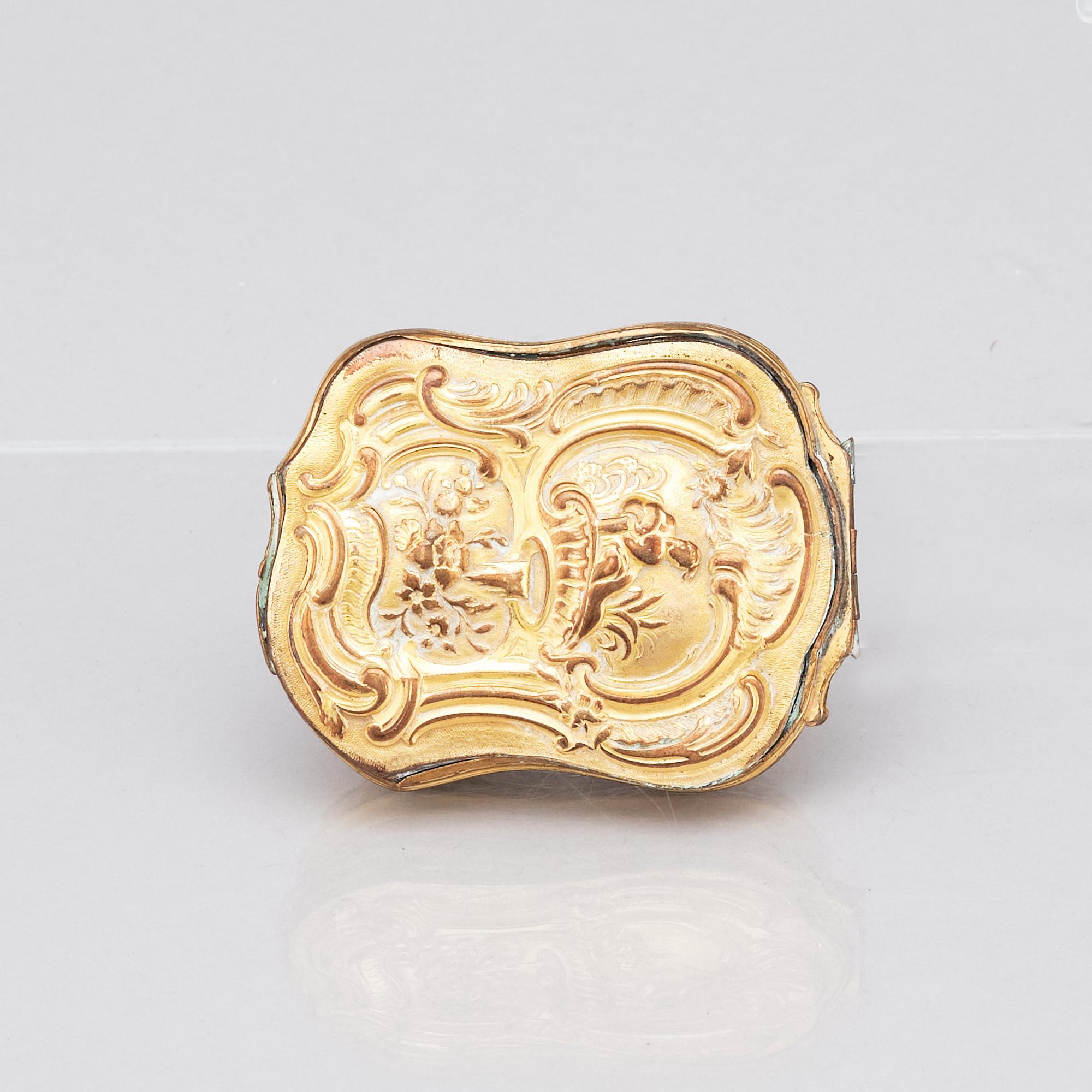 A mid 18th century gilt brass box.