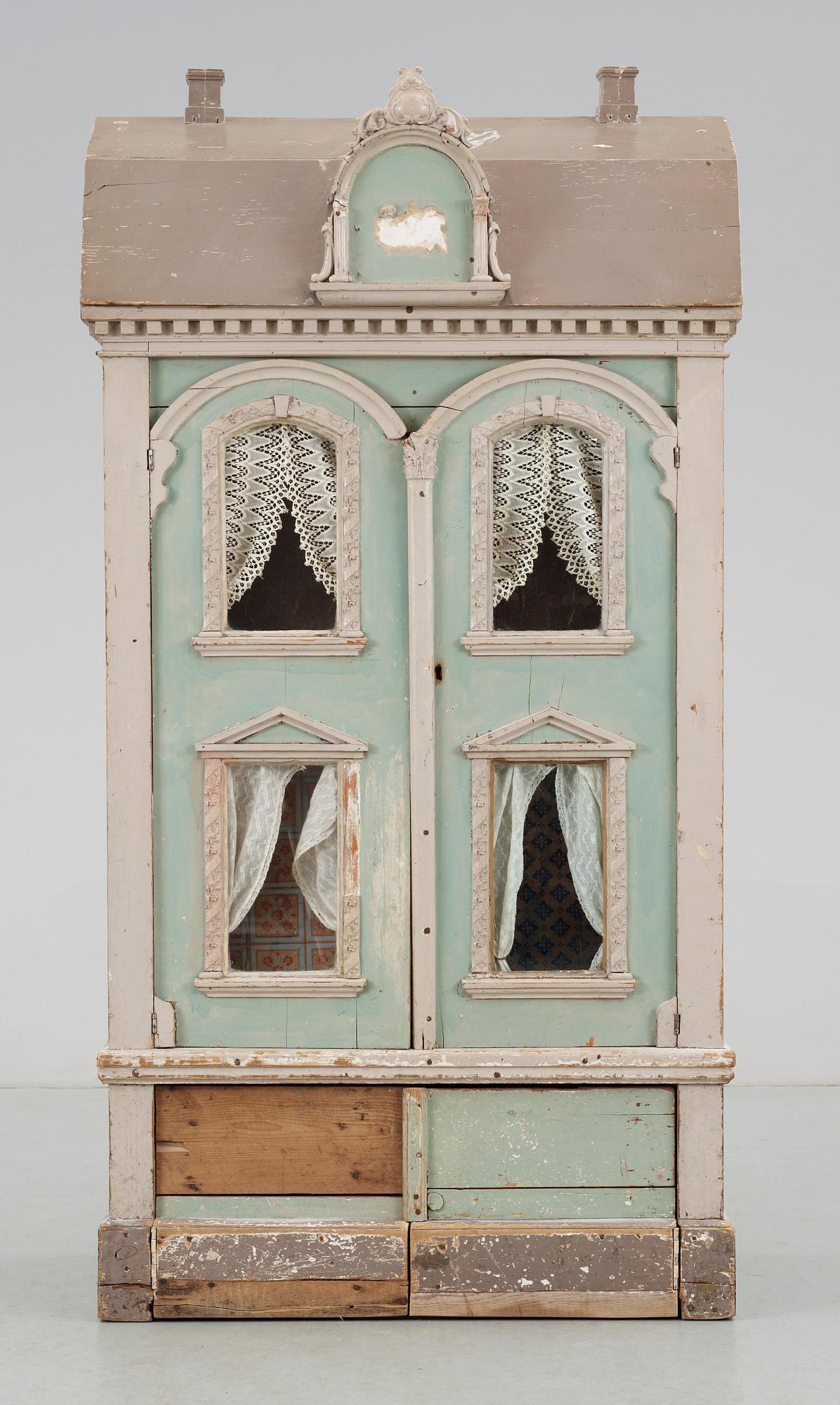 DOCKSKÅP MED MÖBLER, 1800-tal.