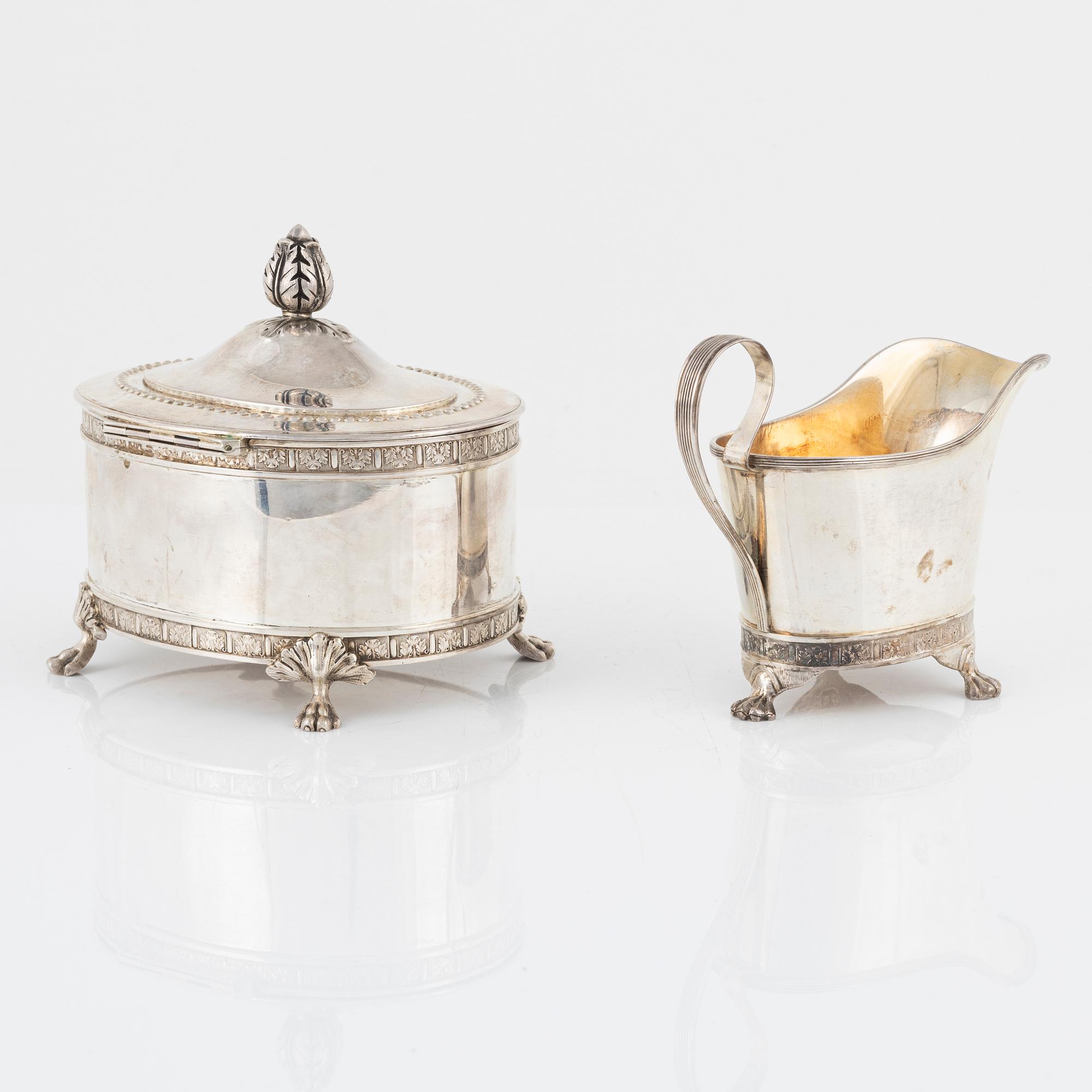 Jacob Engelberth Torsk, a Gustavian style silver creamer and sugar caddy, Stockholm, 1899.