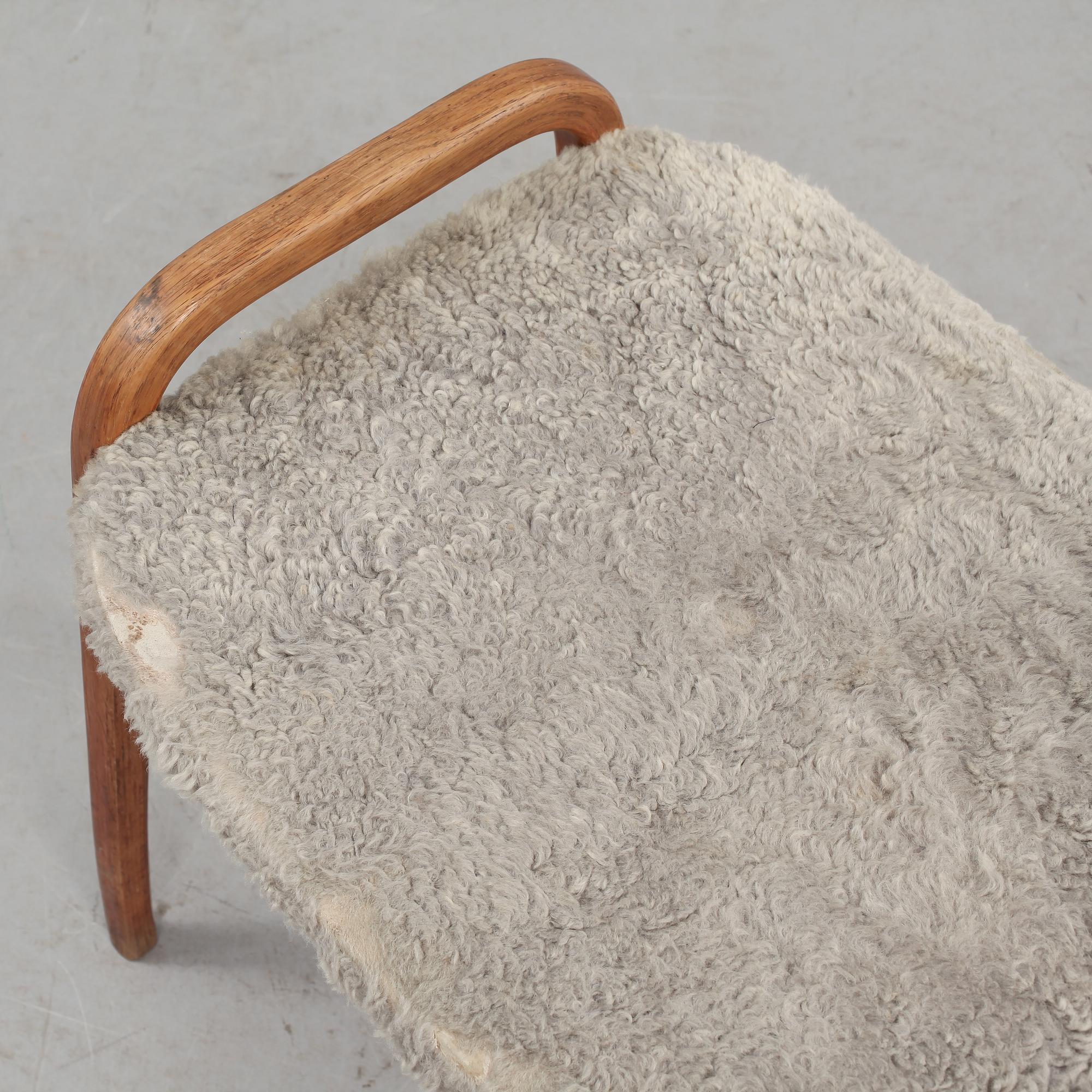 FÅTÖLJ samt FOTPALL, "Lamino", Yngve Ekström, Swedese, 1900-talets fjärde kvartal.