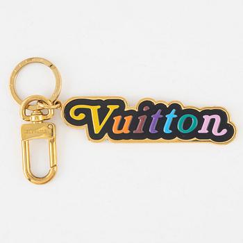 Louis Vuitton, a keychain.