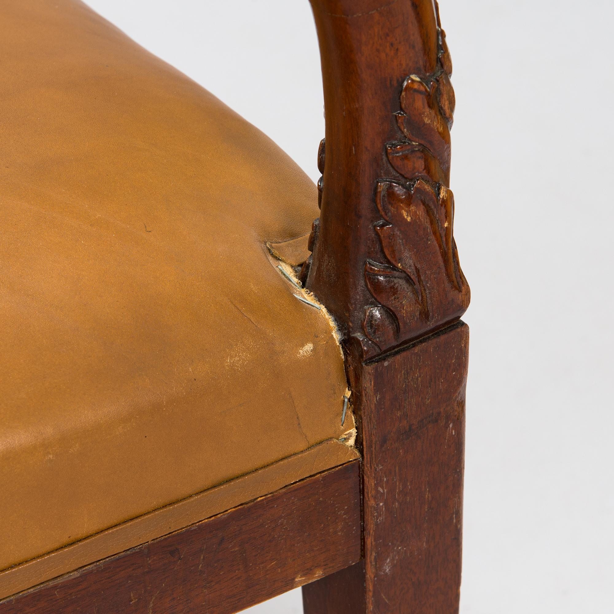 A pair of armchairs, possibly Boman, around 1900.