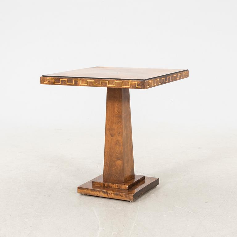 An Art Deco table dated 1940.