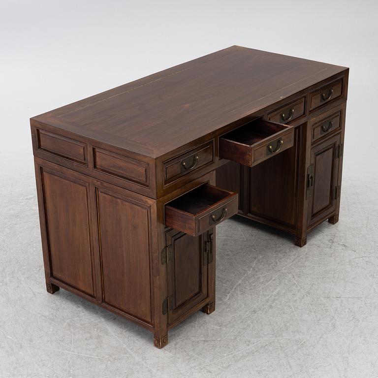 A Chinese hardwood desk, 20th century.
