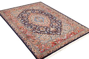 A Kashmar carpet, c. 310 x 203 cm.