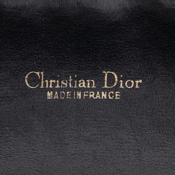 Christian Dior, a canvas bag.