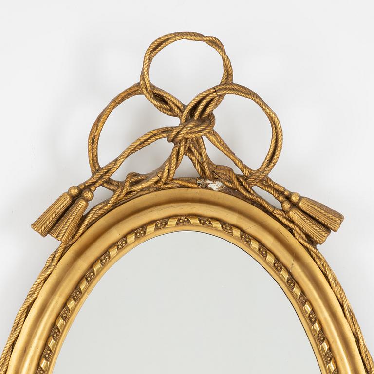 A gilded mirror, early 20th century.