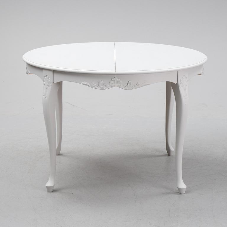 A painted Rococo style dining table, second half of teh 20th century.