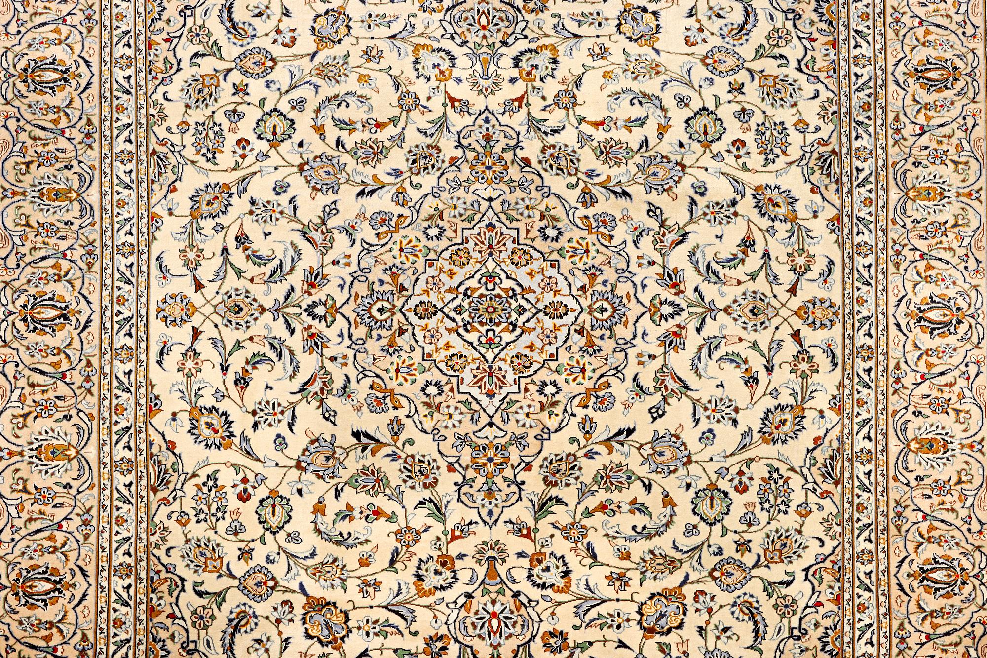 A Kashan carpet, c. 388 x 285 cm.
