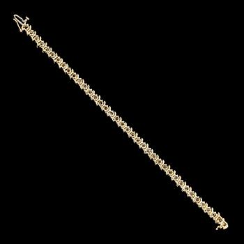 ARMBAND, 14 k guld, briljantslipade diamanter tot ca 5.40 ct.