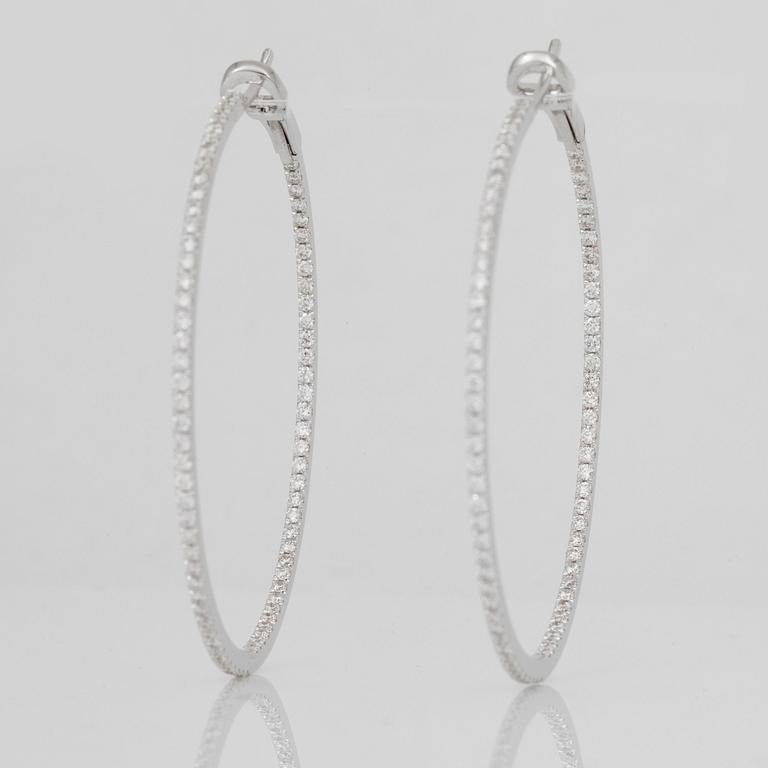 A pair of brilliant-cut diamond hoop earrings. Total carat weight circa 1.80 cts.