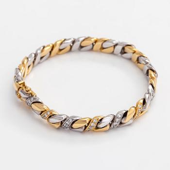 Armband, 18K guld/ vitguld med briljantslipade diamanter totalt ca 1.07 ct.