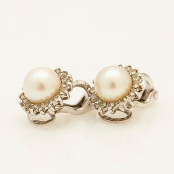 Earrings, a pair, 18K white gold with pearls and diamonds.