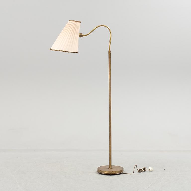 A Swedish 1930/40s brass floor lamp marked B E M.