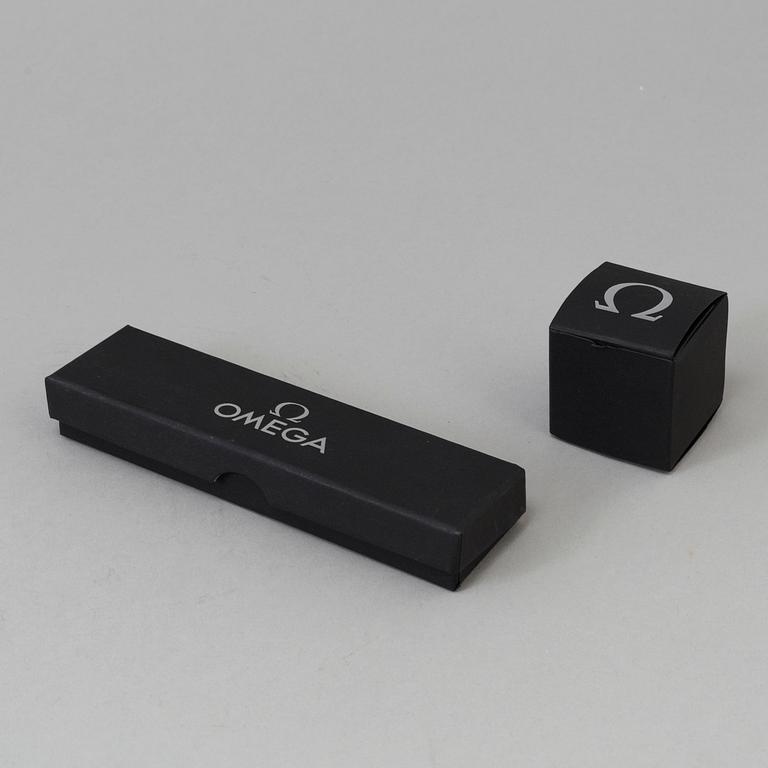 OMEGA, Pen / Loupe / Velcro strap.