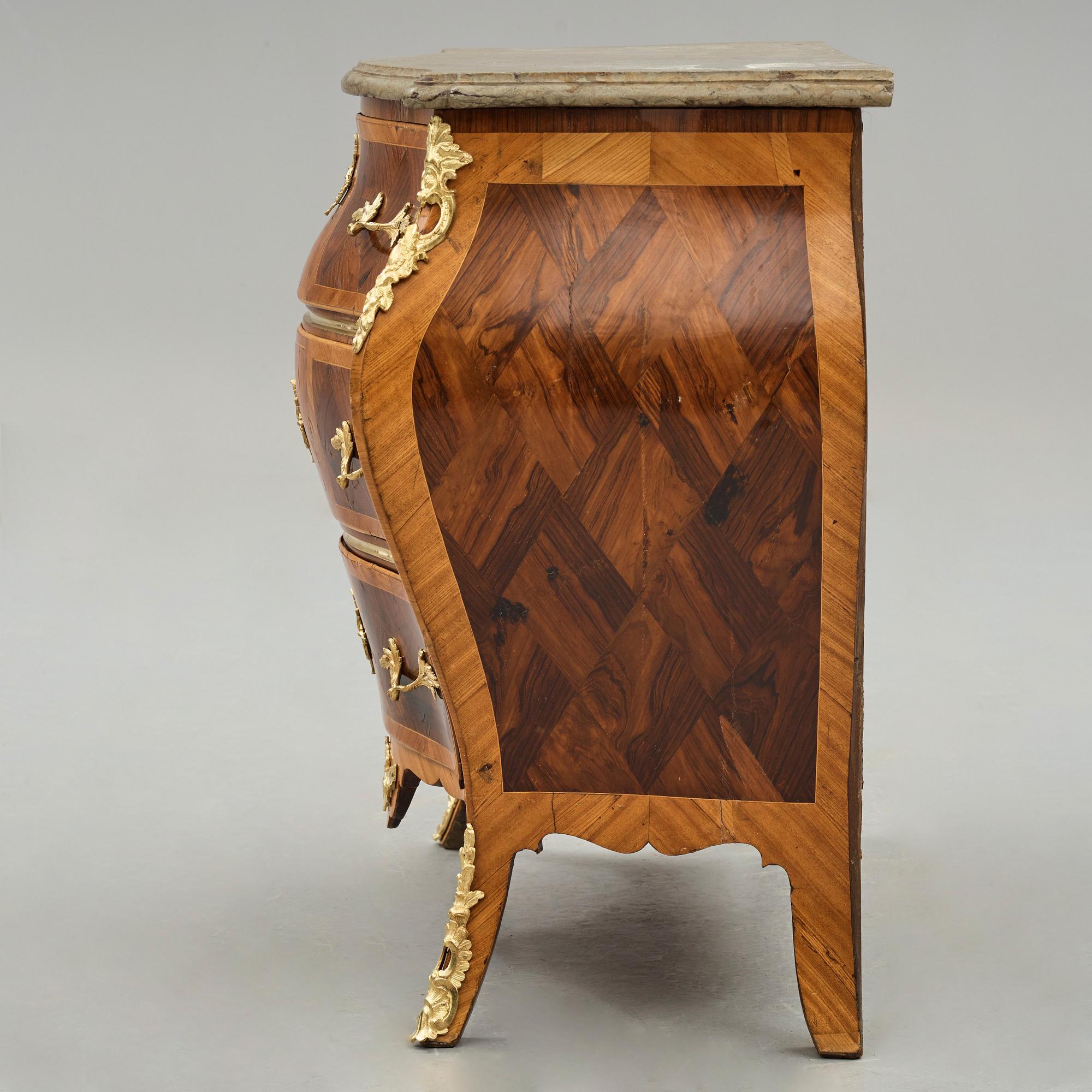 A Swedish Rococo 18th century commode presumably by Gustaf Foltiern (master in Stockholm 1771-1804).