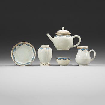 403. A seven piece underglaze blue, gold and bianco sopra bianco tea service, Qing dynasty, Qianlong (1736-95).