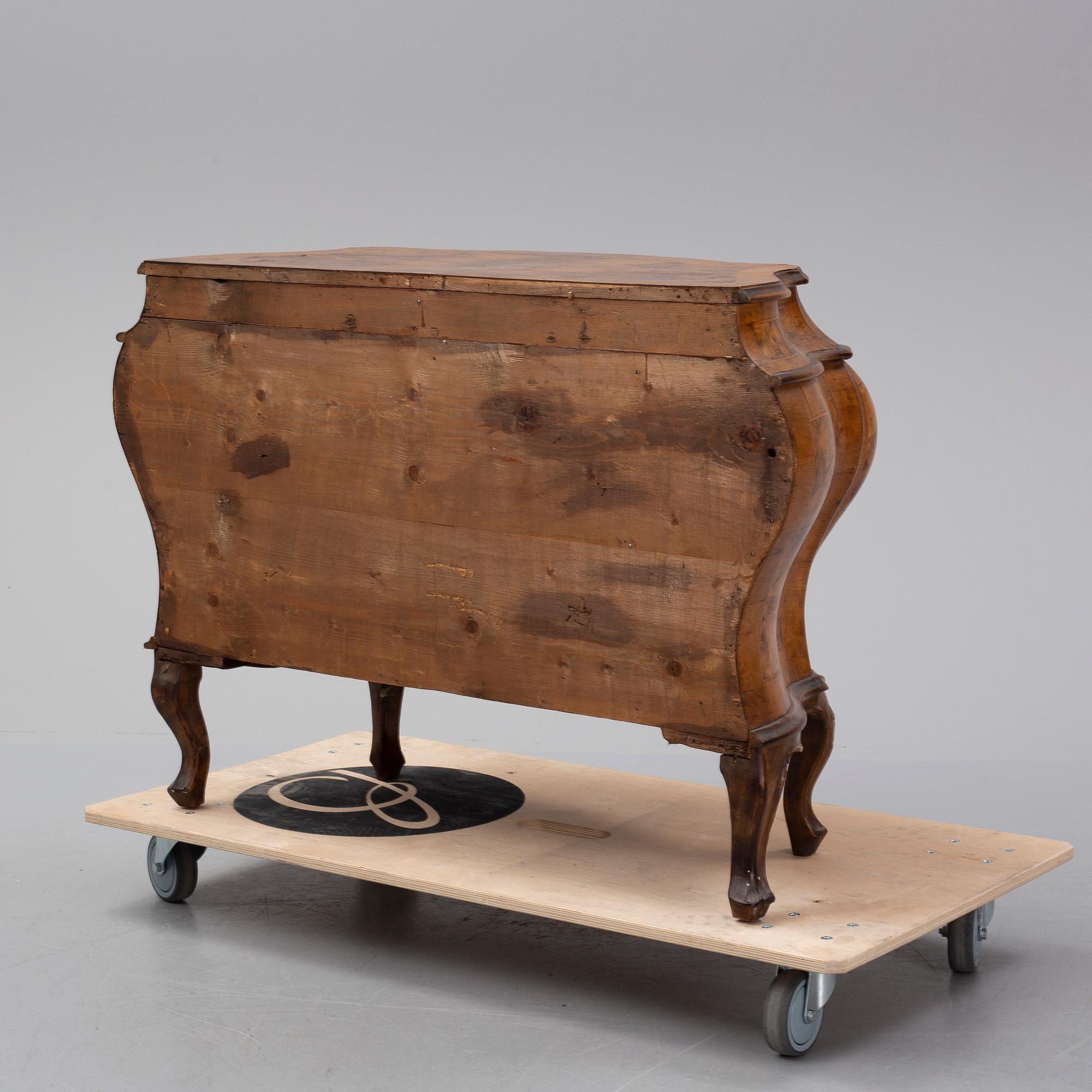 A 20th century Louis XV-style chest of drawers.