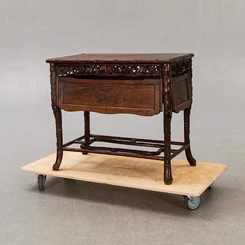 An Asian 20th century serving table.