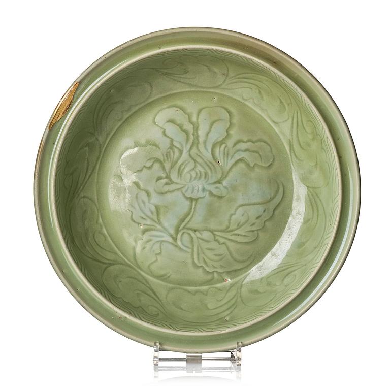 A large carved longquan celadon 'lotus' dish, Song/Ming dynasty.