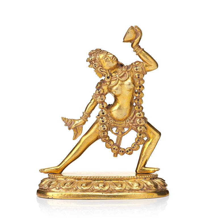 DAKINI, bärnnförgylld brons. Tibetokinesisk, 1800-tal.